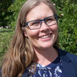 A person smiling for the camera