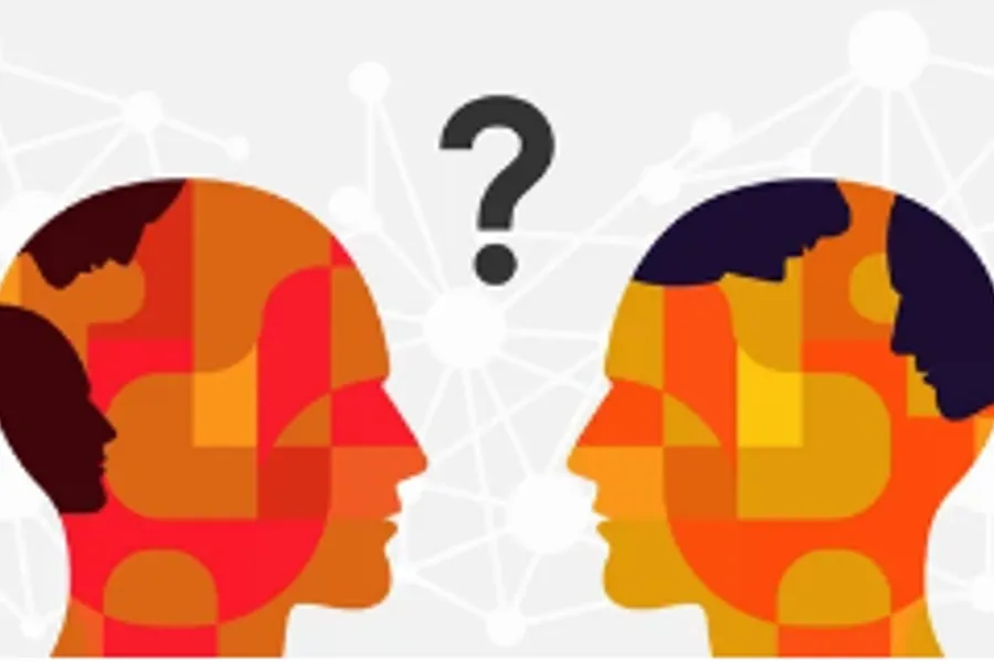 To ansikter er vendt mot hverandre med et spørsmålstegn mellom seg